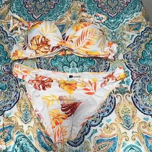 Brand Tahiti, size large, only been worn once